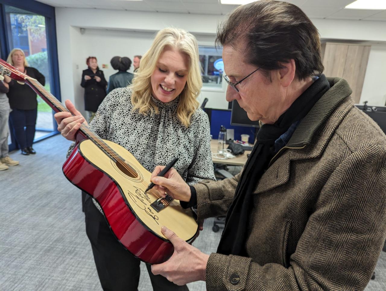 **Guitar signed by Shakin' Stevens!** Powered by Givergy